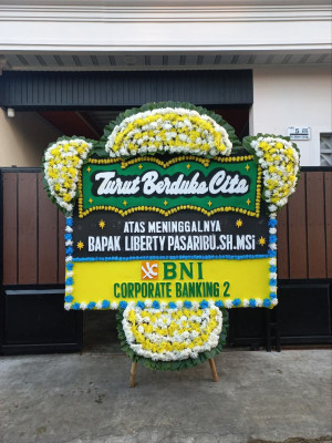 Papan Bunga Duka di Bangun