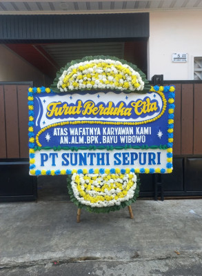 Papan Bunga Duka di Bangun