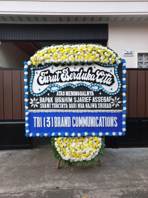 Papan Bunga Duka di Bangun